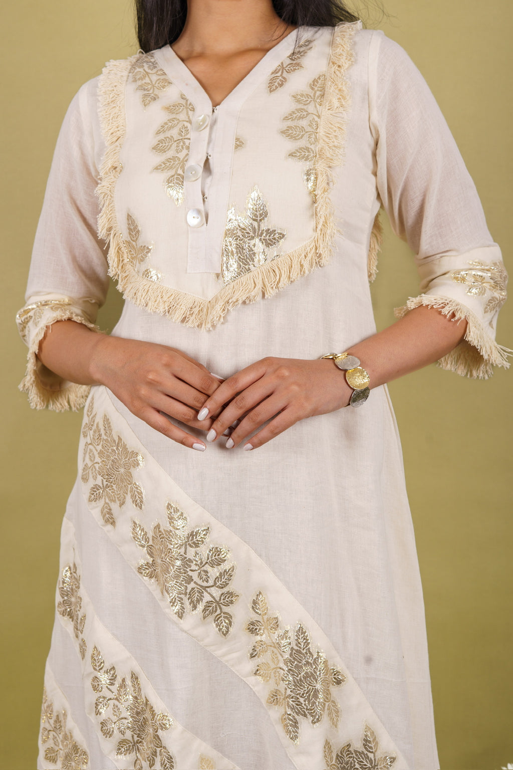 Off-white cotton dress with silver patti appliqué