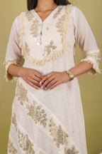 Off-white cotton dress with silver patti appliqué