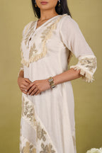 Off-white cotton dress with silver patti appliqué